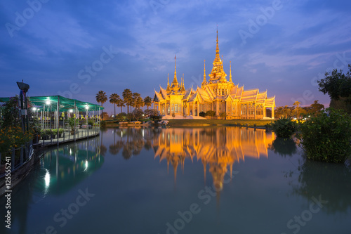 Wat Luang Pho Toh temple with water reflection in twilight time 