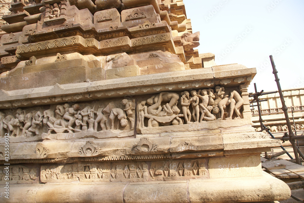 Sculptures of loving couples, illustrating the Kama Sutra, on walls of Lakshmana Temple at