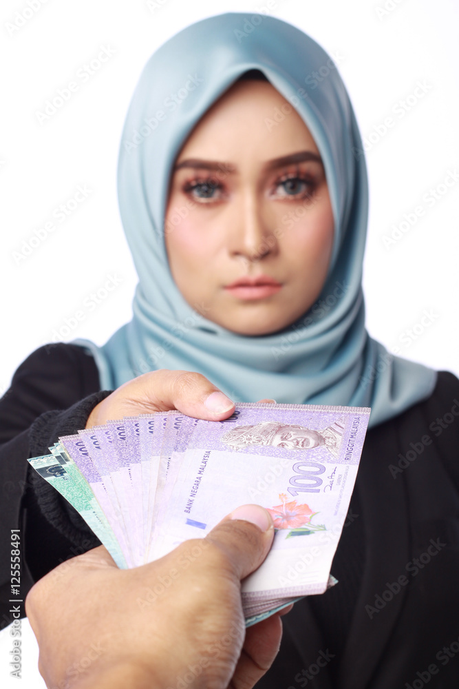 woman holding a bribery money woman holding a bribery money