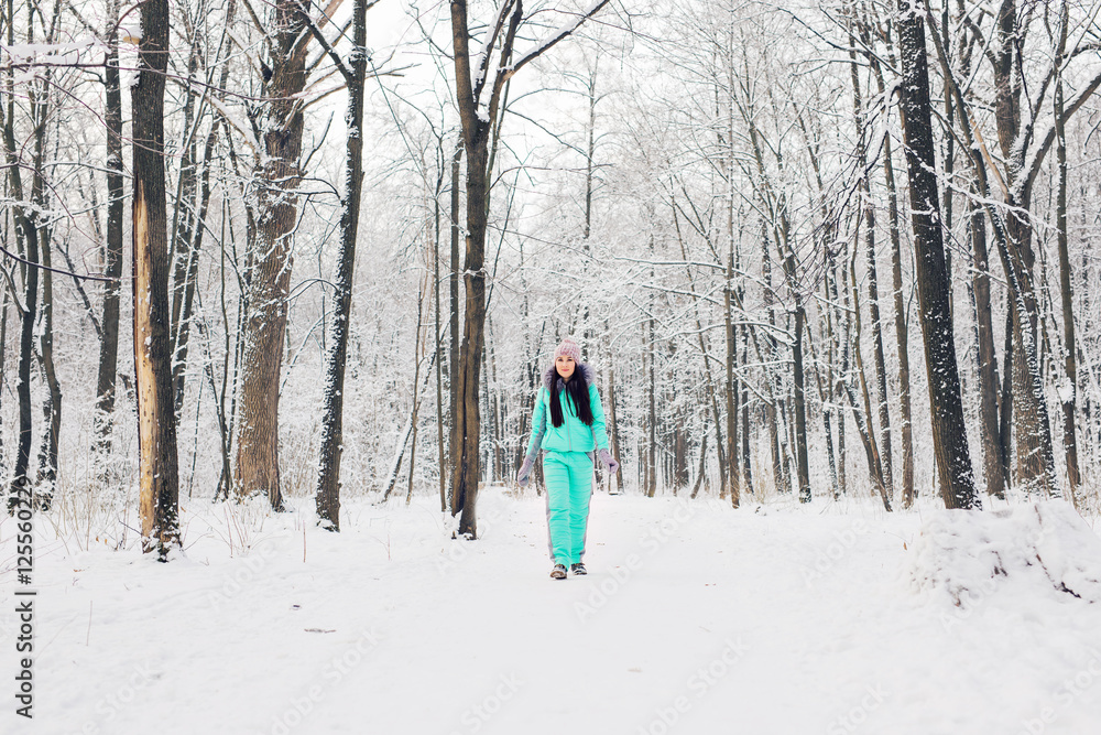 beautiful girl in the winter outdoors. Christmas.