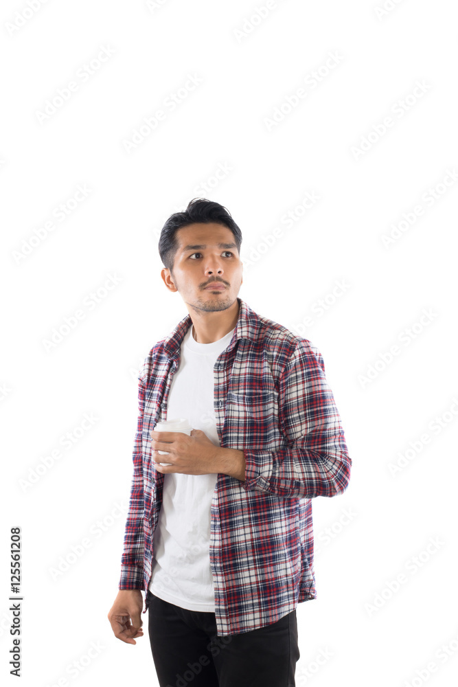 Portrait of handsome young hipster man standing , holding cup of Portrait of handsome young hipster man standing , holding cup of