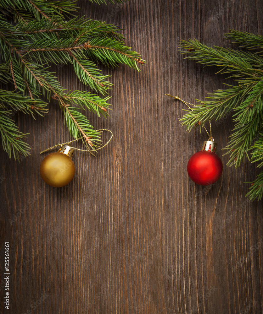Obraz premium Christmas Tree and decorations on wooden background