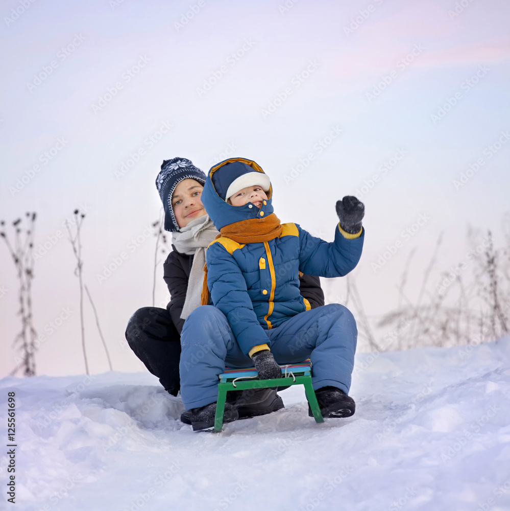 happy boys on sled happy boys on sled