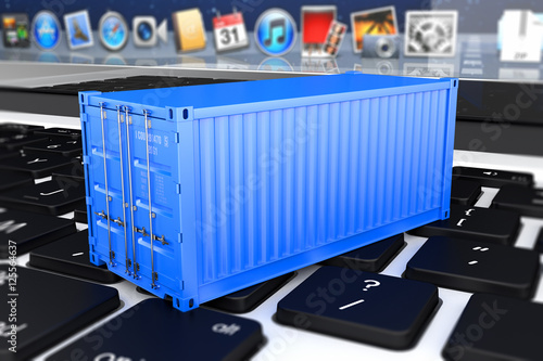 Fotografie container on the laptop keyboard 3D