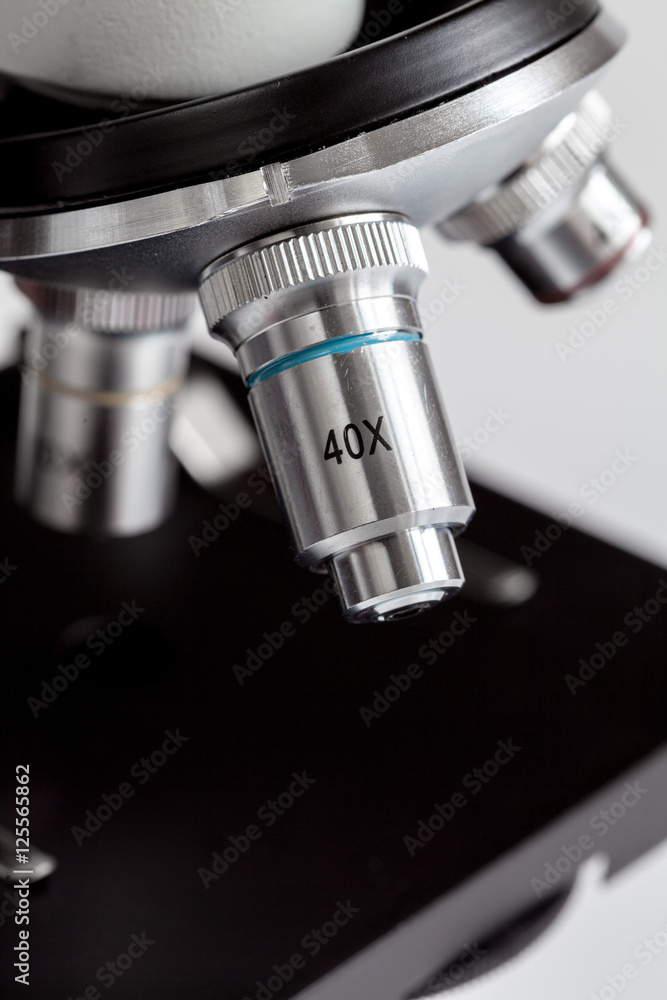 close up macro microscope on white background close up macro microscope on white background