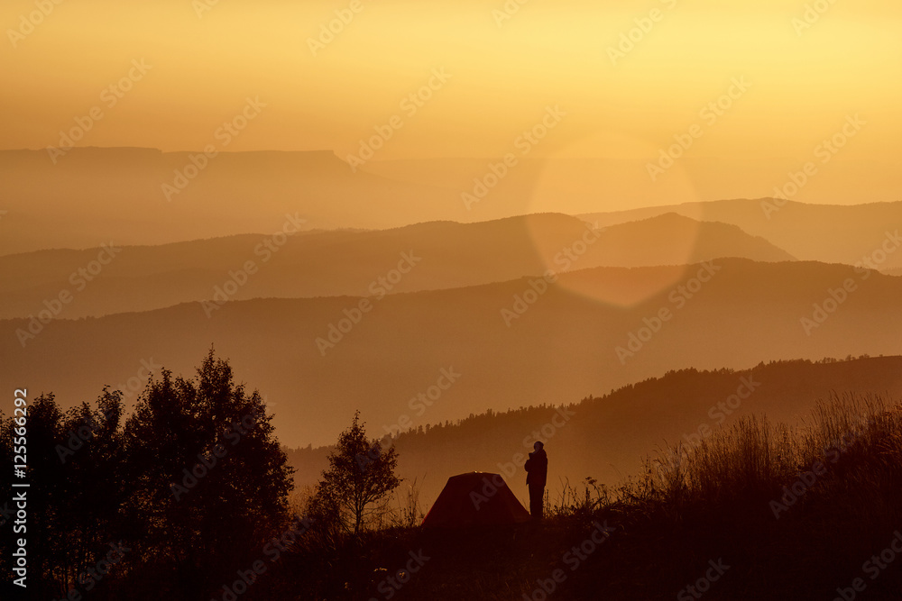 She meets a dawn in mountains