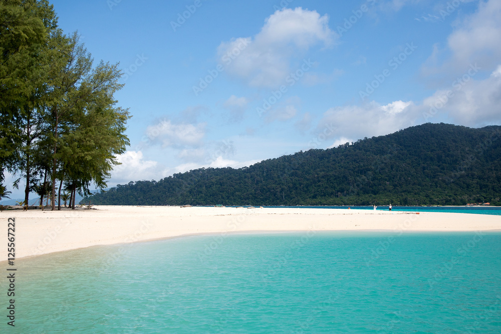 Ko Lipe, Thailand   Tourists lay on the pure white sand in front