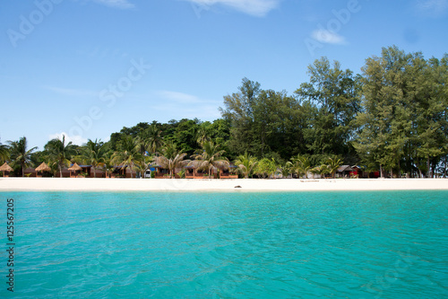 Fototapeta Naklejka Na Ścianę i Meble -  Ko Lipe, Thailand   Tourists lay on the pure white sand in front