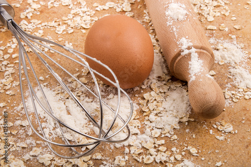 ingredients and accessories to bake scottish oatmeal biscuits
