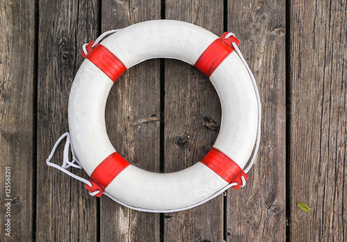 Close-up View of a Life Buoy on a Wooden Pier