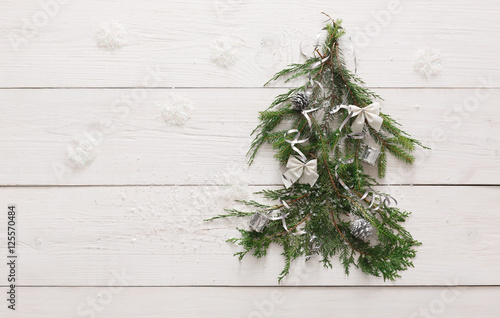 Christmas tree background at white wood with copy space