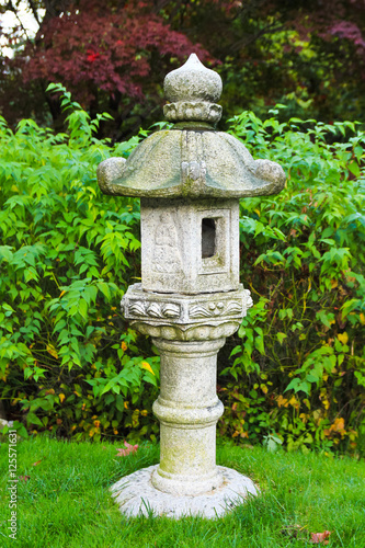 stone pagoda, stone tower / A view of stone pagoda, stone tower in the garden 