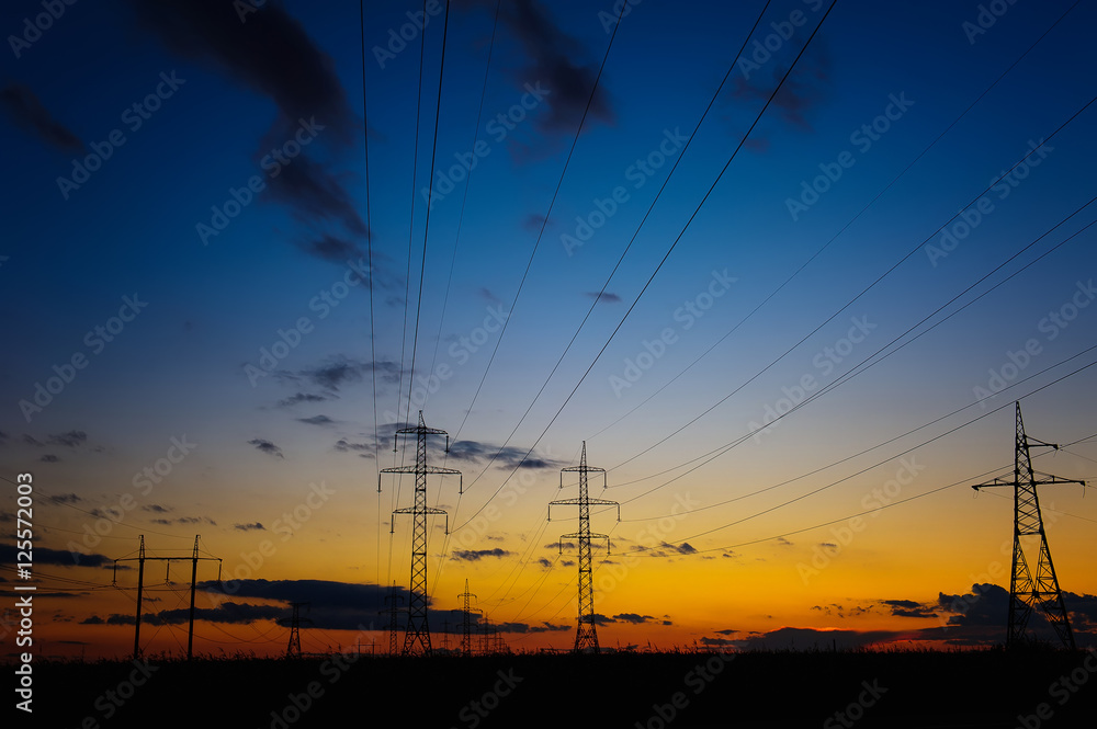 Silhouette of high voltage power lines