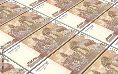 Cambodia riels bills stacks background. 3D illustration.