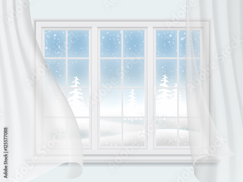 View of the winter landscape through a window with transparent curtains. Interior wall of the living room.
