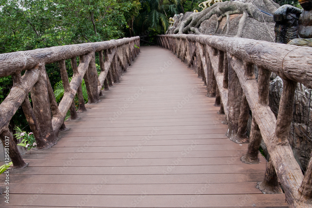 Wood bridge in the zoo at Thailand