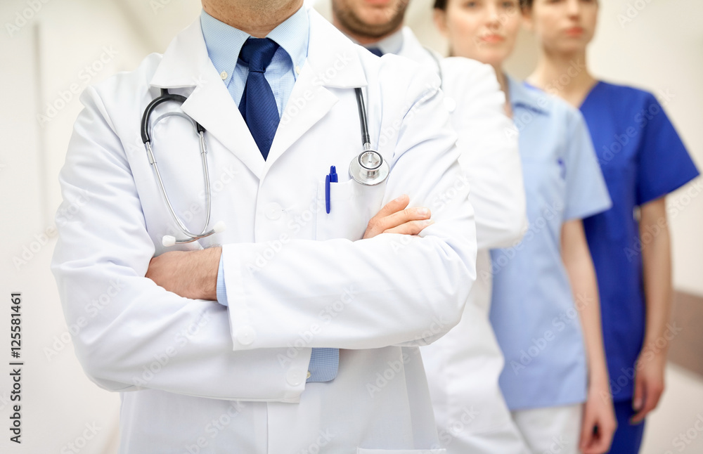 close up of medics or doctors at hospital corridor close up of medics or doctors at hospital corridor