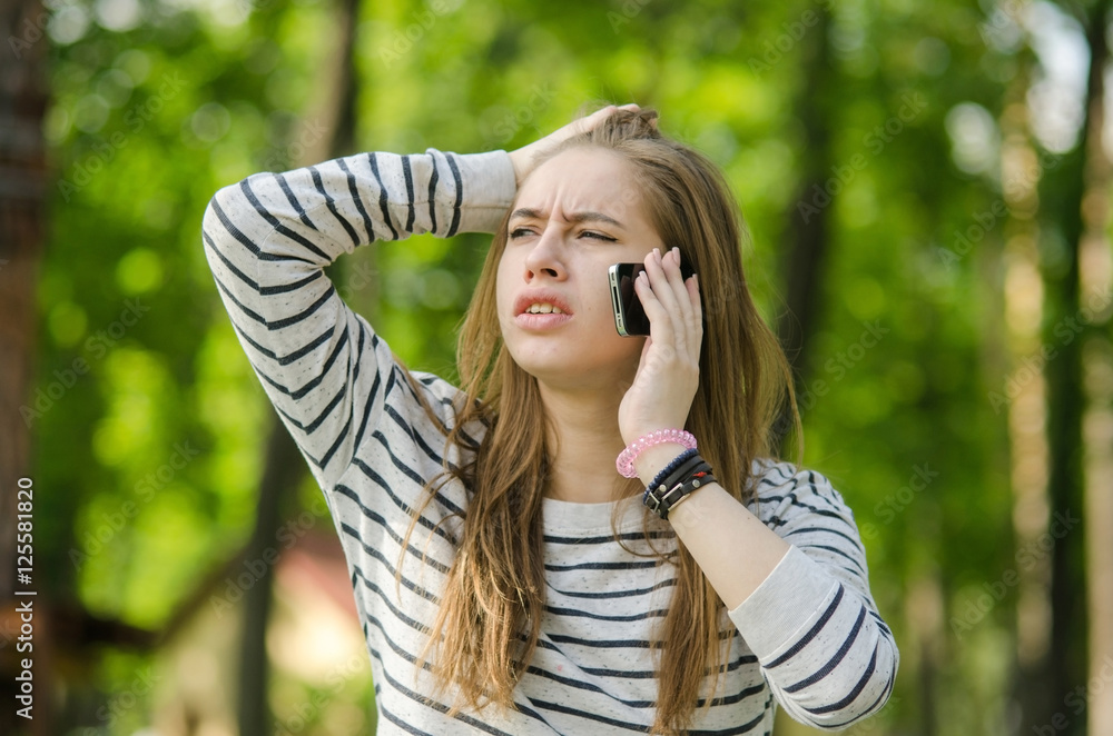 Young woman using her phone Young woman using her phone
