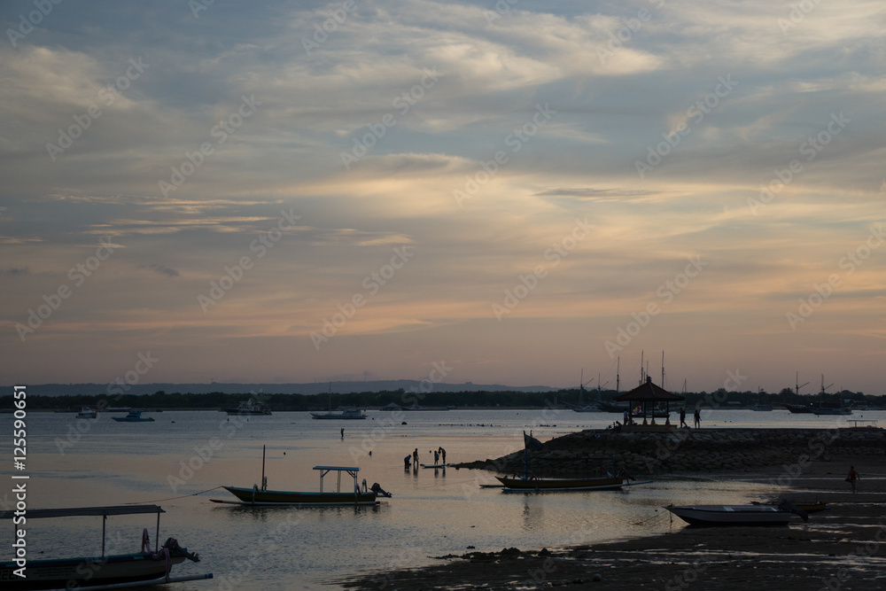 Fishing boat silhouette in seaside