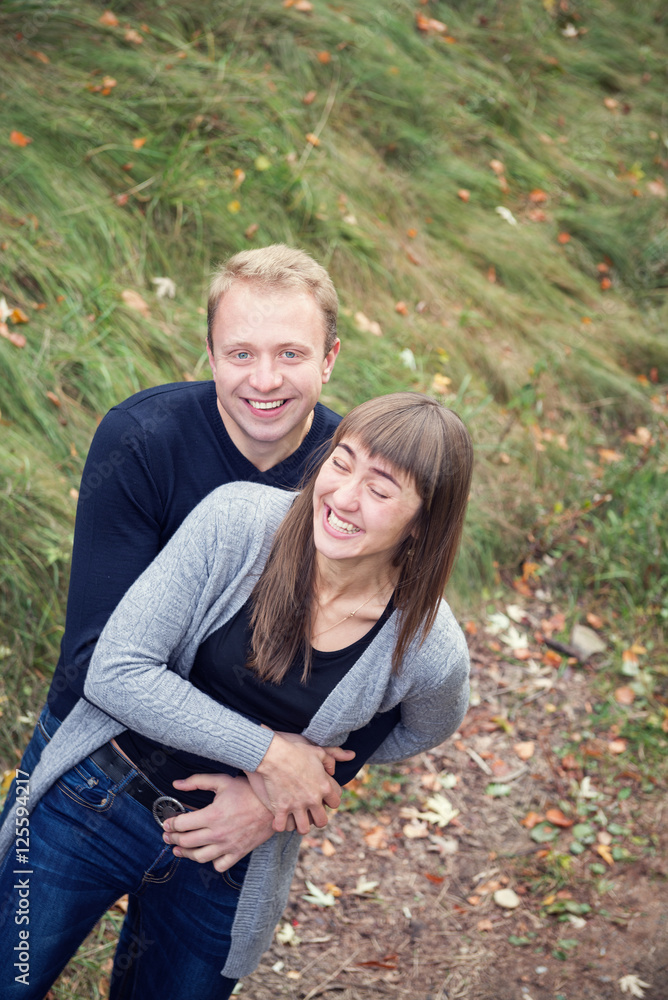 Romantic couple in love having fan outdoors Romantic couple in love having fan outdoors