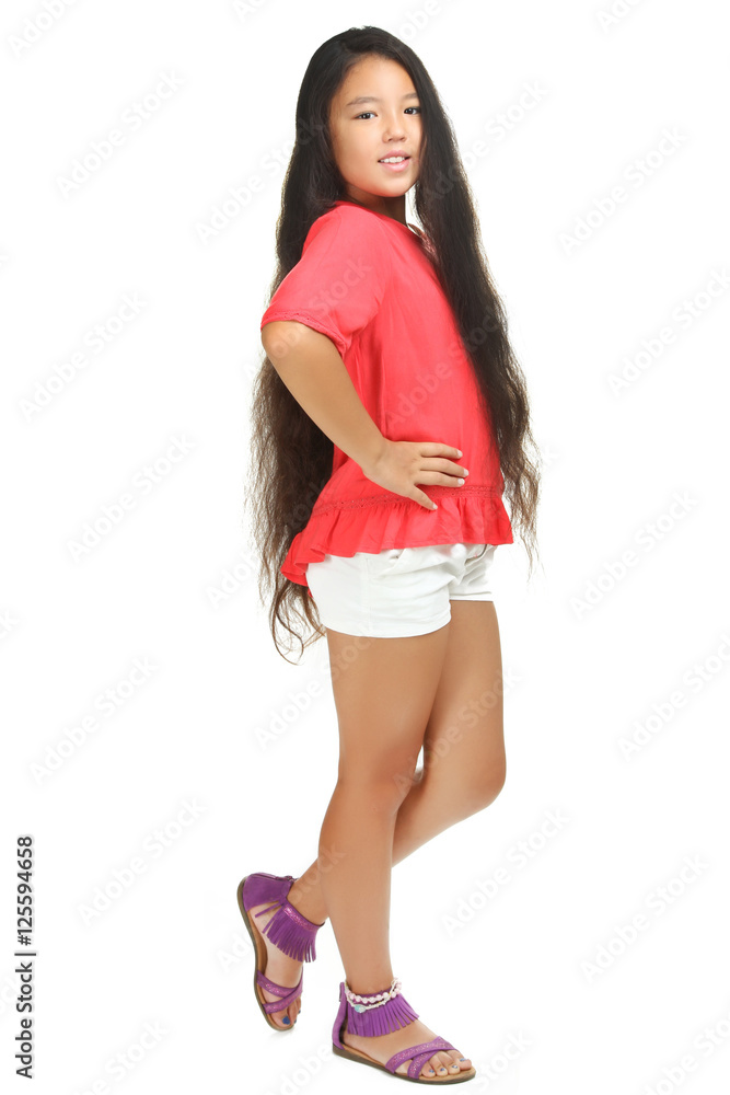 Happy little girl posing on a white background Happy little girl posing on a white background
