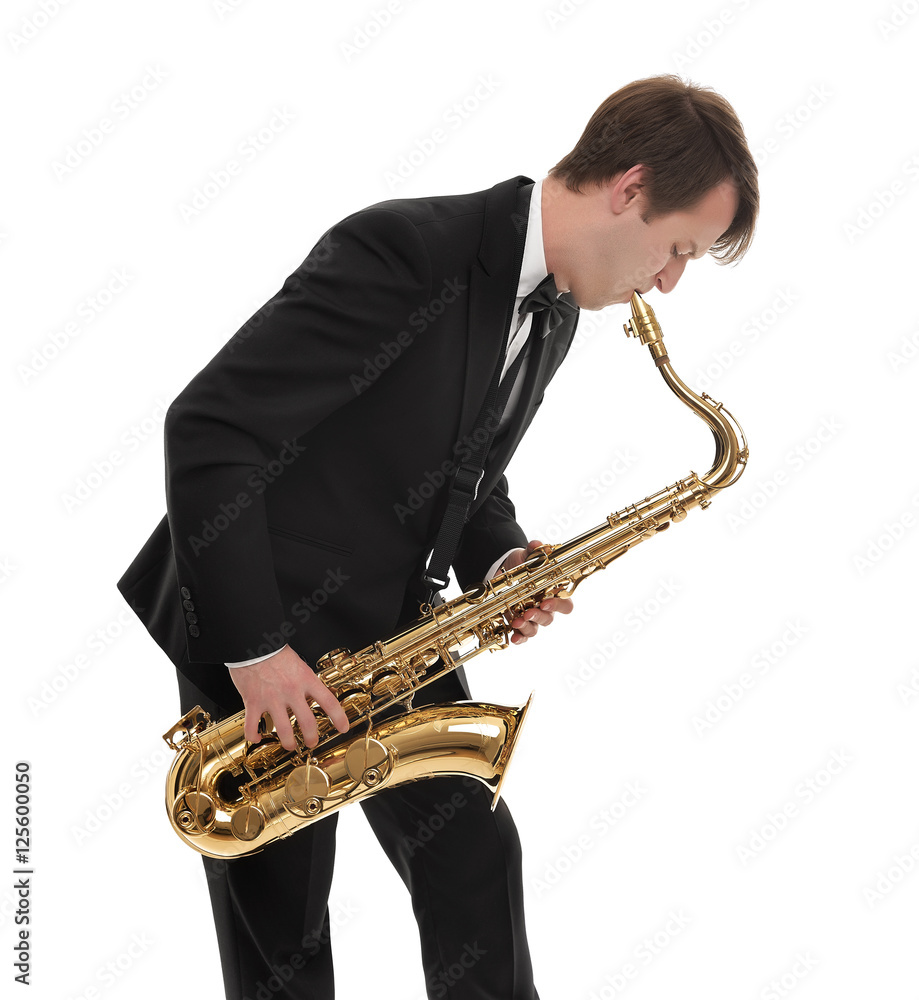 Naklejka premium Saxophonist in a tuxedo plays music on sax.