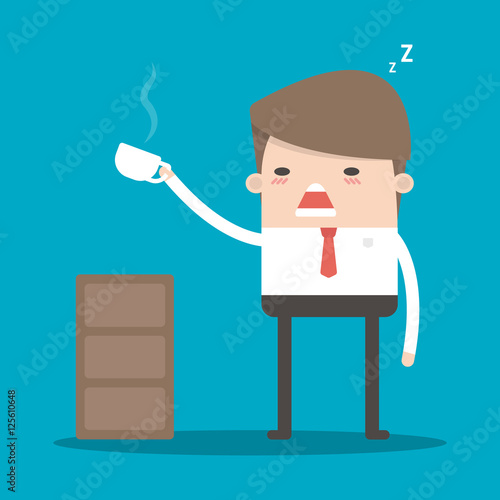 businessman drink coffee because of drowsiness