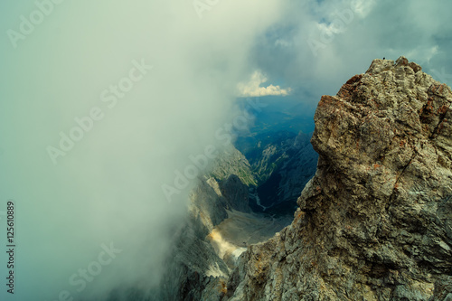 Beautiful view from highest mountain peak Zugspitze near Garmisch Partenkirchen. Summer day with amazing view at several peaks. Bavaria, Germany.