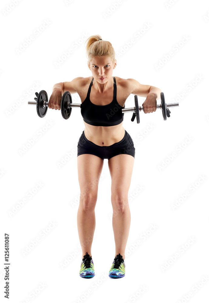 Fitness girl doing dumbbell rows on white Fitness girl doing dumbbell rows on white