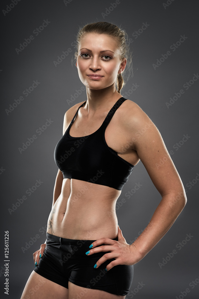 Fitness model posing Fitness model posing
