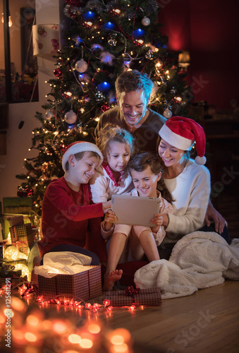 At christmas a lovely family find a digital tablet in their gift