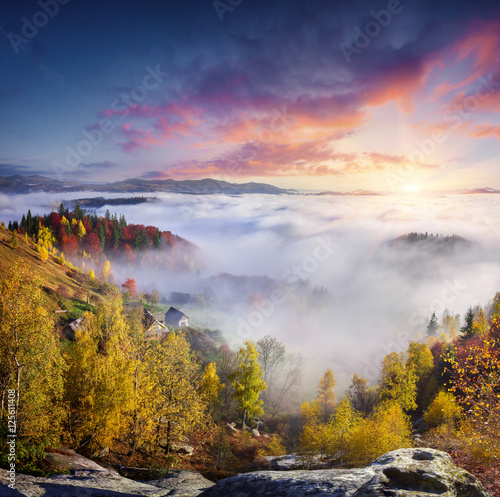 Foggy morning scene in the mountain village Babyn. © Andrew Mayovskyy