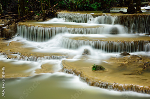 Waterfall in tropical deep forest