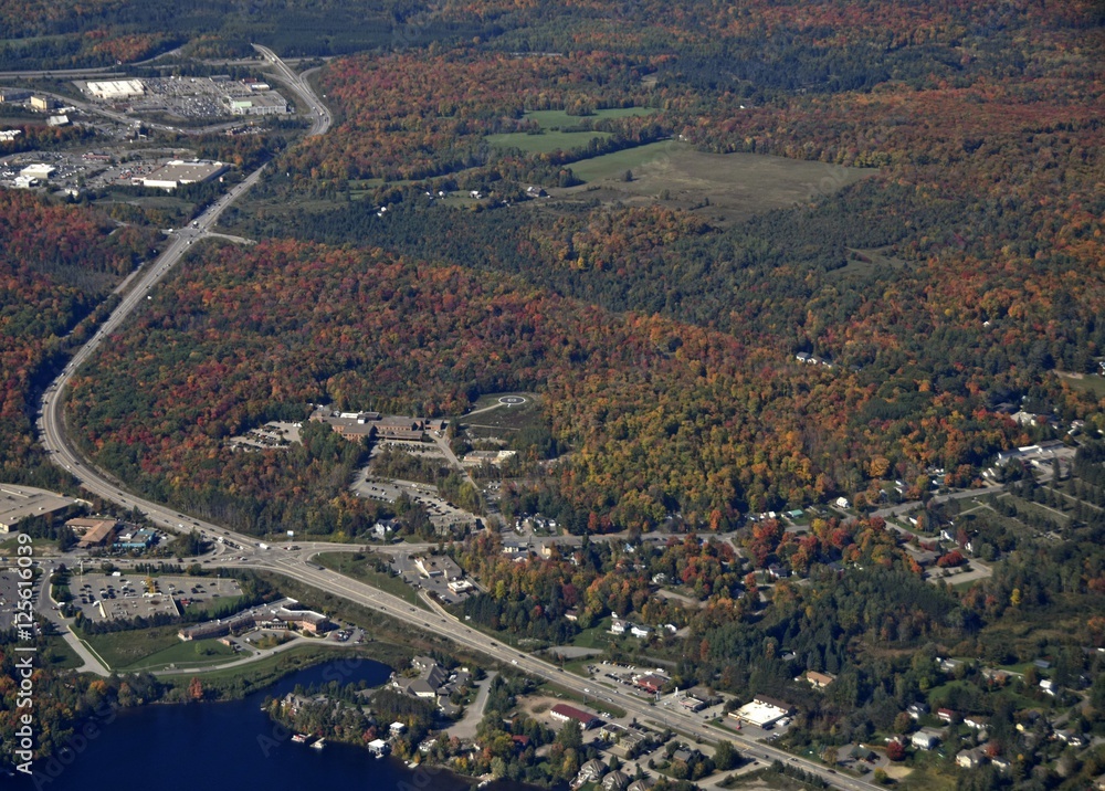 aerial view in Autumn of Huntsville in the Muskoka region of Ontario Canada aerial view in Autumn of Huntsville in the Muskoka region of Ontario Canada