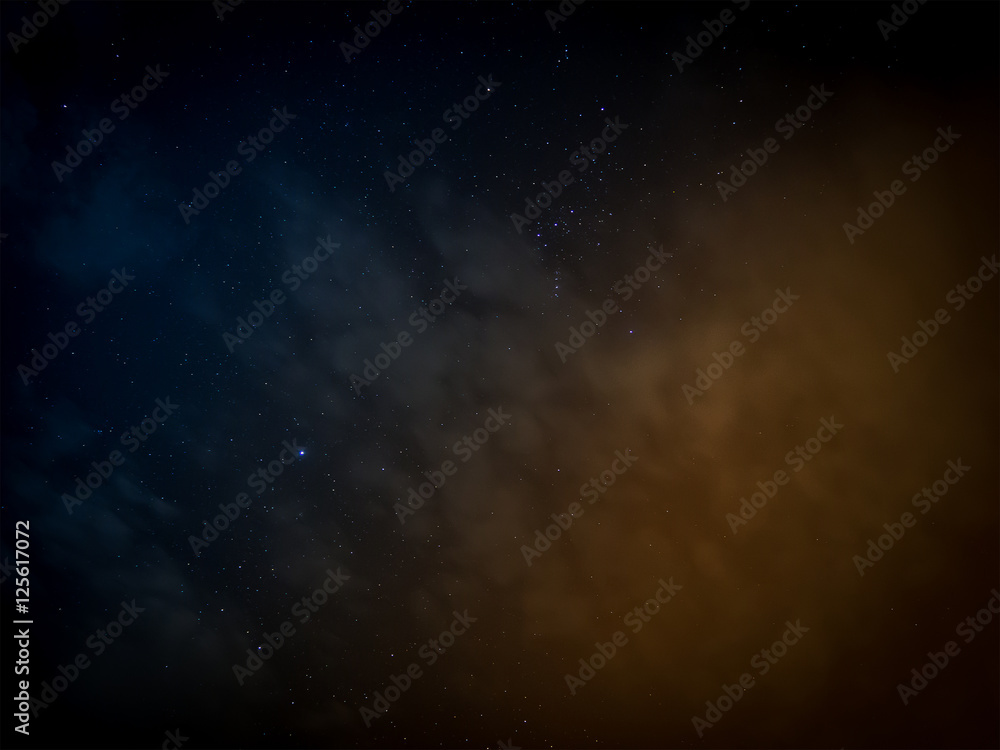 Stars and Cloudy in sky on blue and orange tone