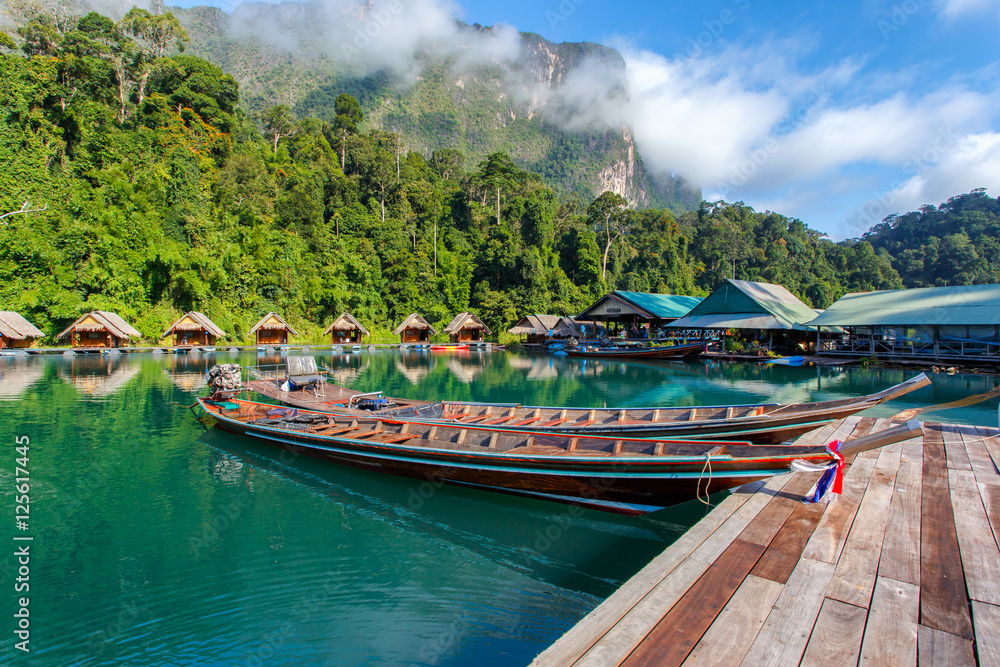Naklejka premium Travel by small boats, Ratchaprapha dam area in Surat Thani province, Thailand.