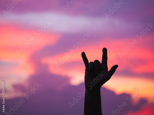 Hand symbol of "LOVE" in silhouette style.