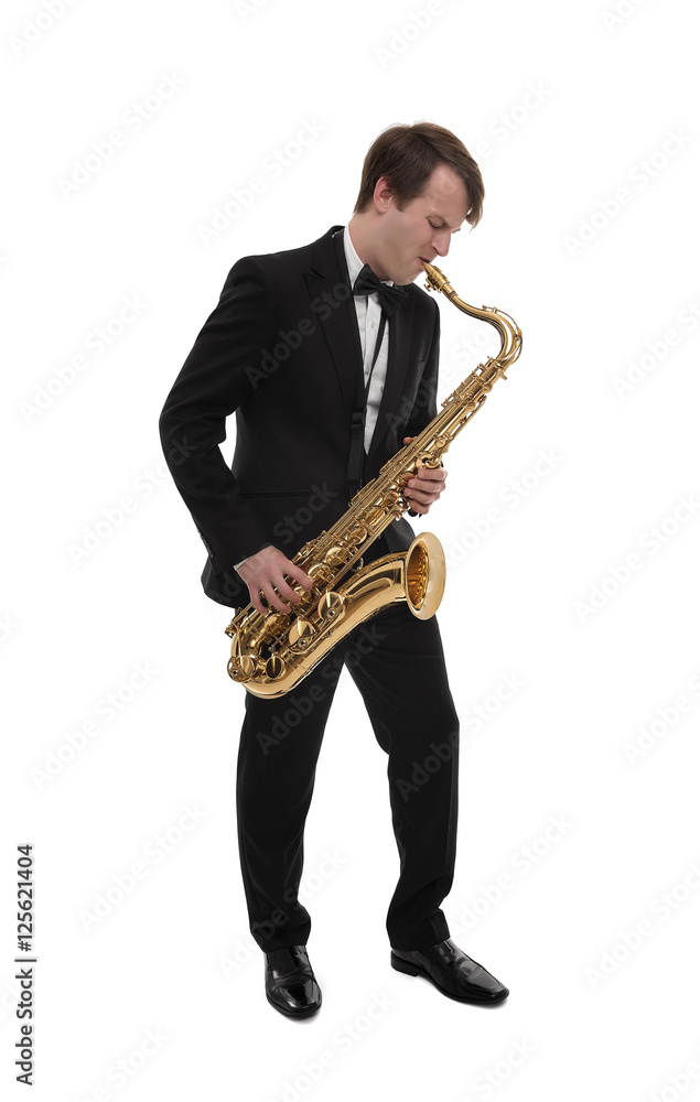 Naklejka premium Saxophonist in a tuxedo plays music on sax.