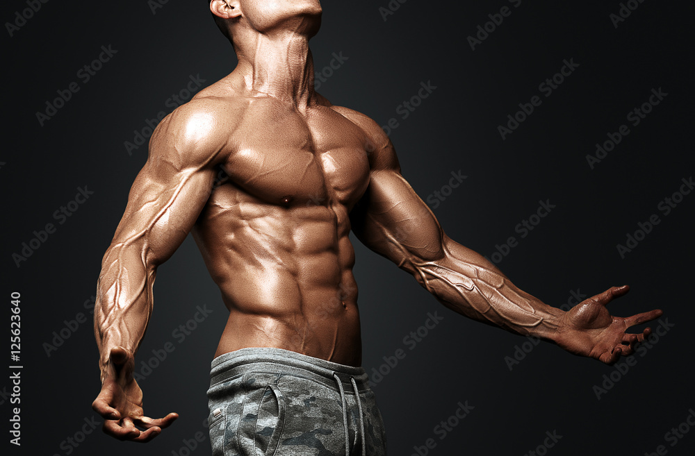 Strong Athletic Man Fitness Model Torso showing six pack abs.