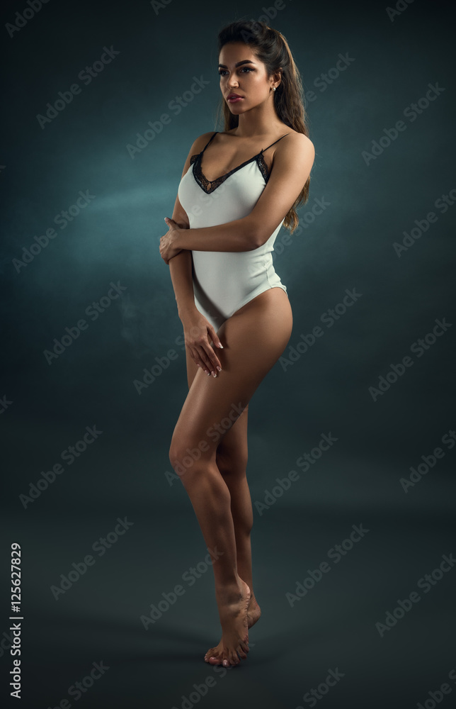 Sexy girl in a white bodysuit Sexy girl in a white bodysuit