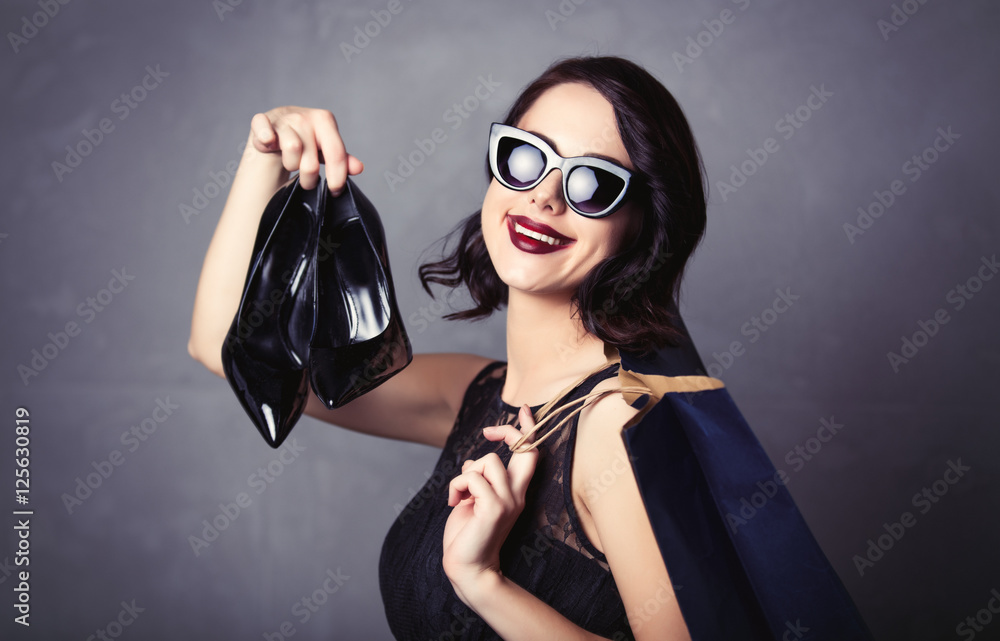 Fototapeta premium woman with bags and heels
