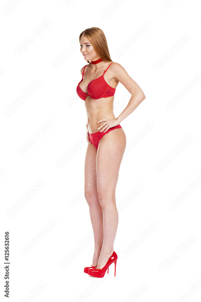 Obraz premium Young beautiful blonde woman in red bikini