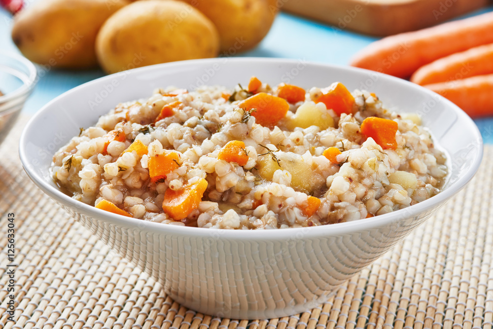 Buckwheat soup in white bowl Buckwheat soup in white bowl
