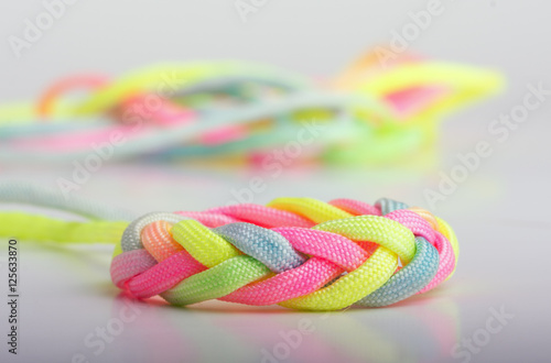 Wallpaper Mural Paracord braided into a decorative knot, in bright neon colors Torontodigital.ca