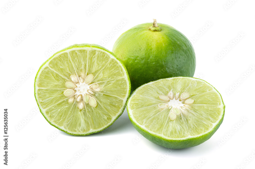 Fresh lime fruit and half of lime on white background Fresh lime fruit and half of lime on white background