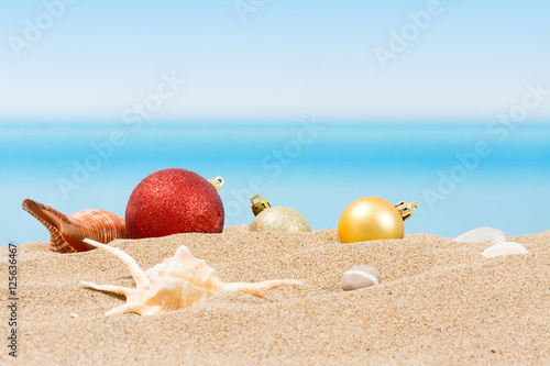 Christmas tree decorations on the beach in tropical. Concept of