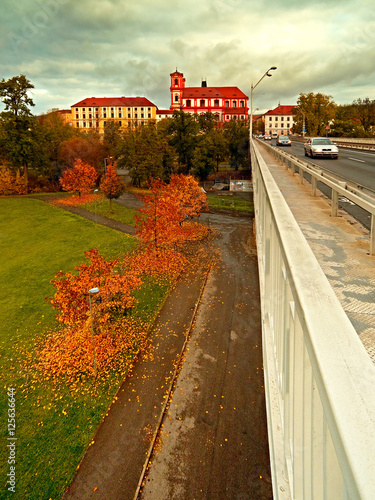 Litomerice city, Czech rebublic - october 29, 2016: detail of autumnal city park when viewed from the bridge Tyrsuv most after reconstruction photo