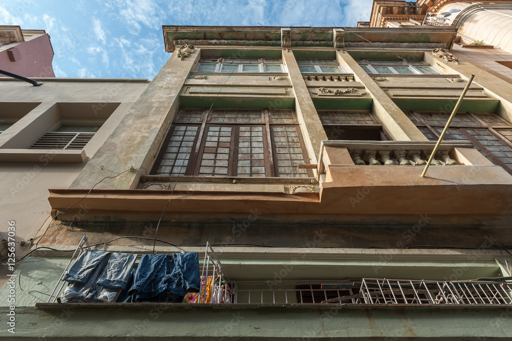 Clothes hanging to dry on old building in Havana, Cuba
