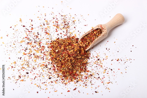 scattered seasoning on a white background