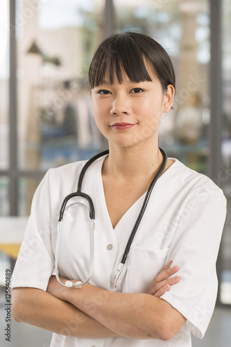 Portrait of asian nurse in clinic Free Download Portrait of asian nurse in clinic - GFXLoad